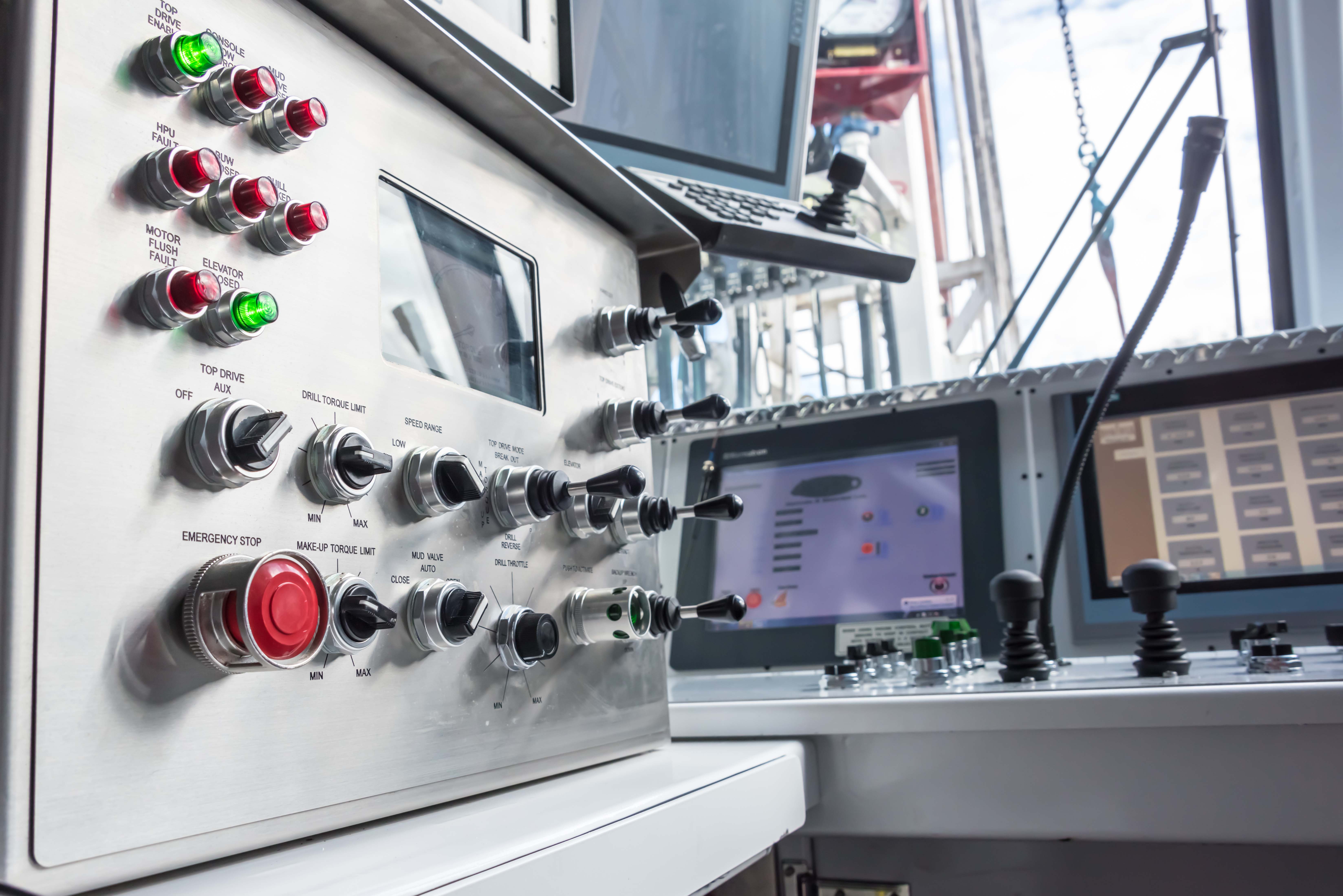 Oil rig controls and switches in operators room on rig floor