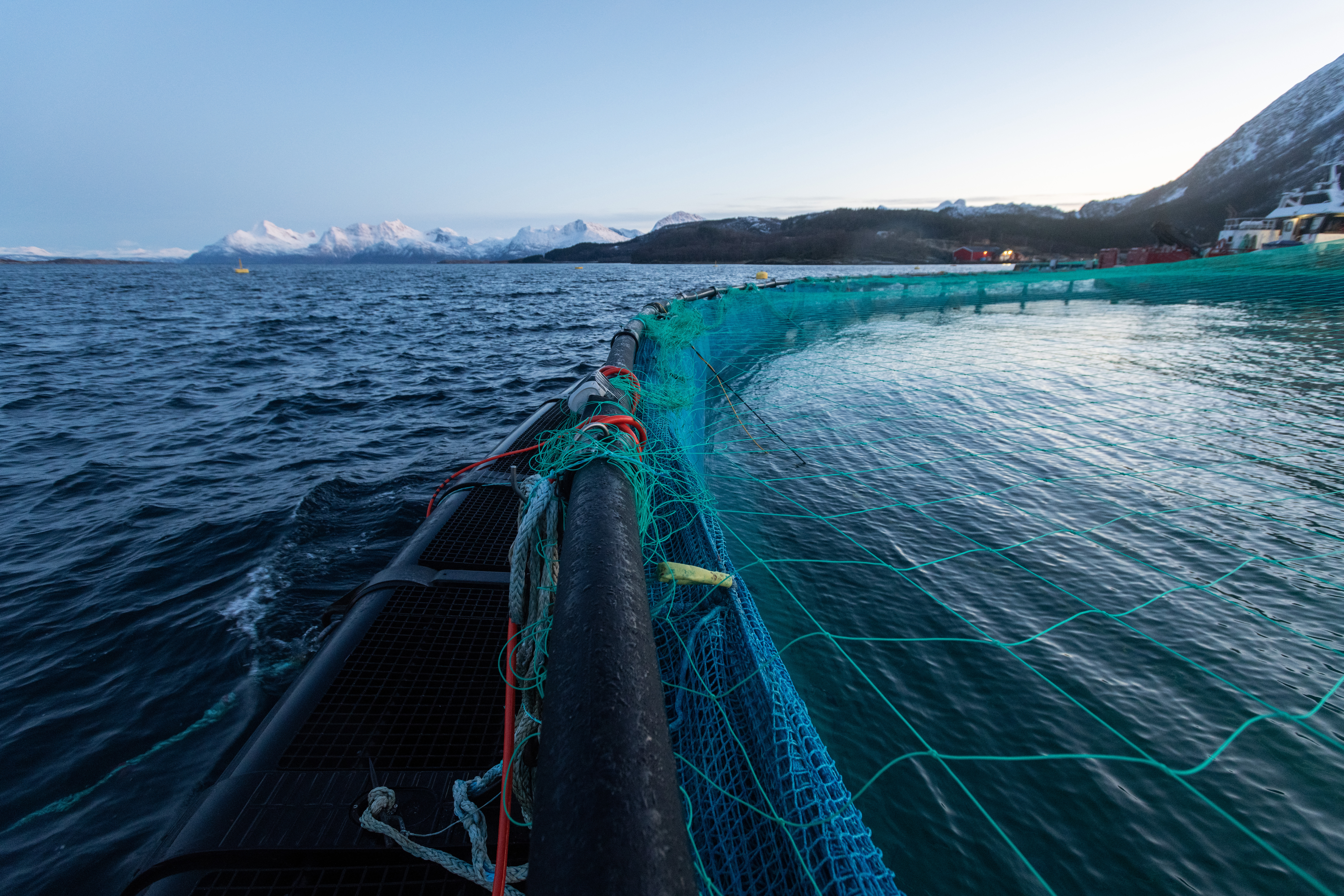 Aquaculture net pen system in open water used for modelling current, wave, and environmental conditions