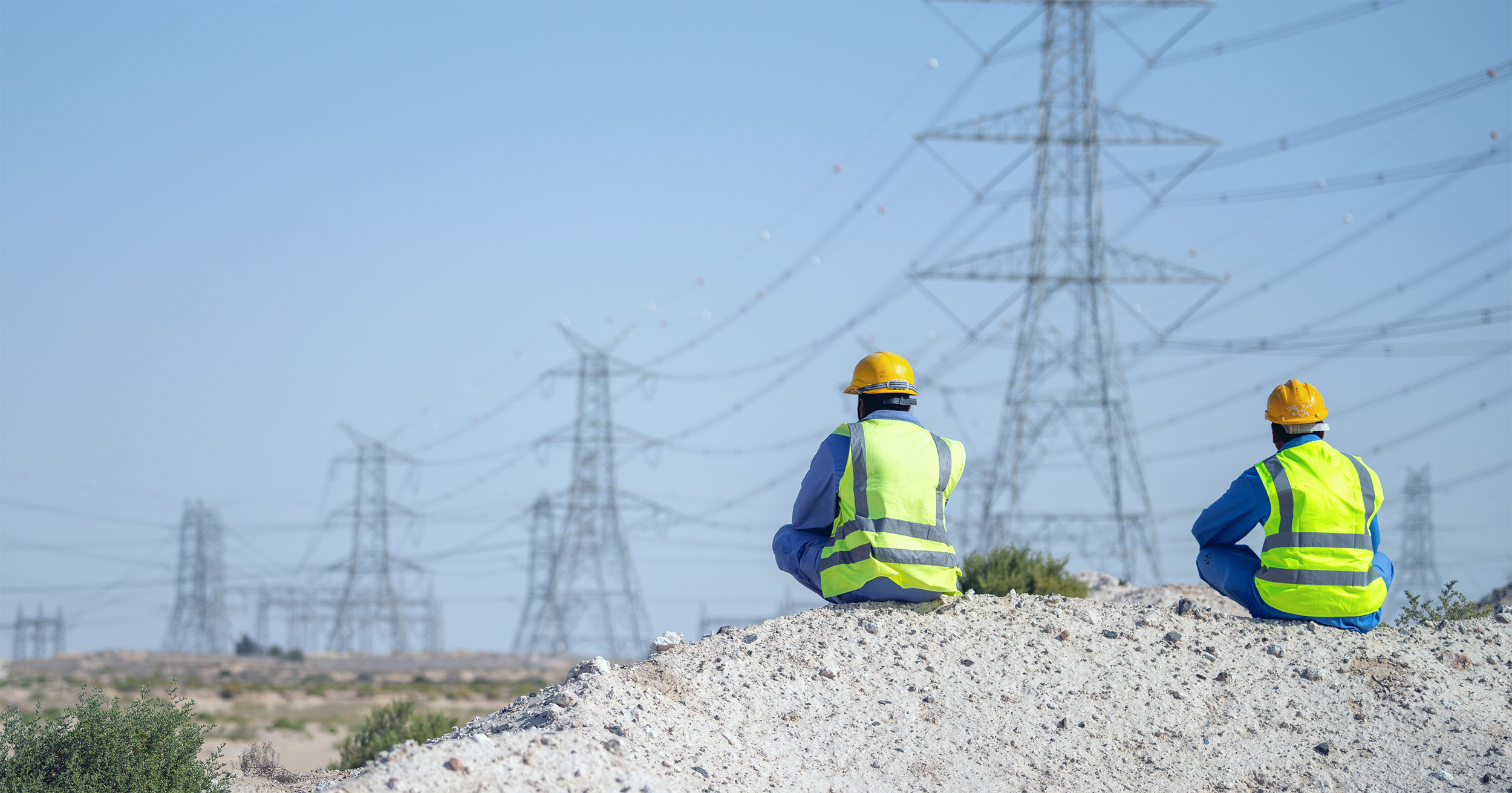 Two workers and power grids