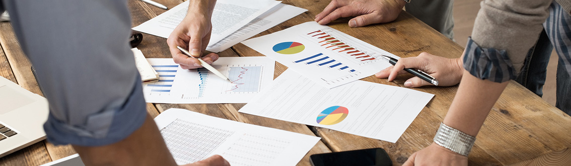 Desk with tables spread around